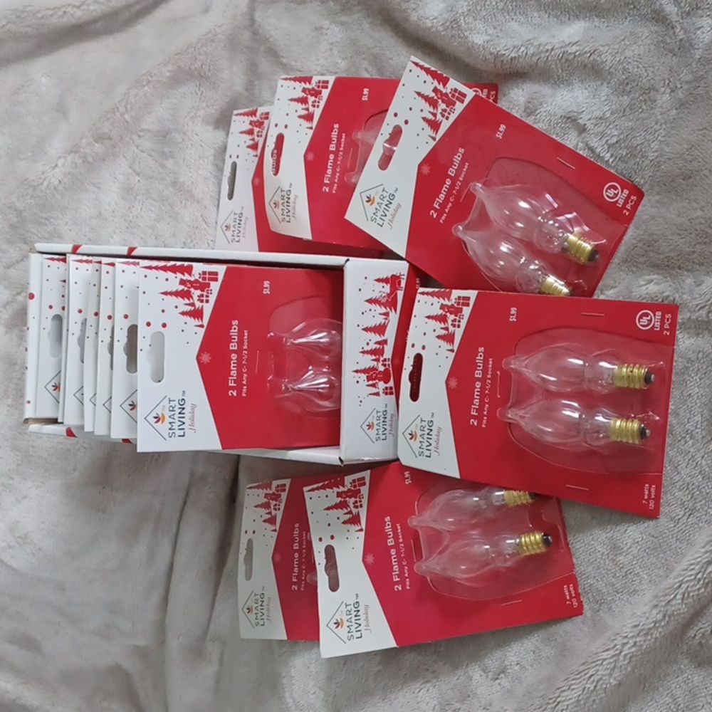 12 packages of Smart Living 2 Flame Bulbs- 26 bulbs in total NIB